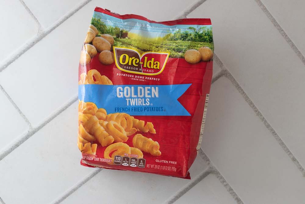 A package of Ore-Ida golden twirls french fried potatoes.