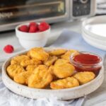 plate of cooked chicken nuggets