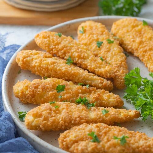 serving plate of cooked chicken tenders