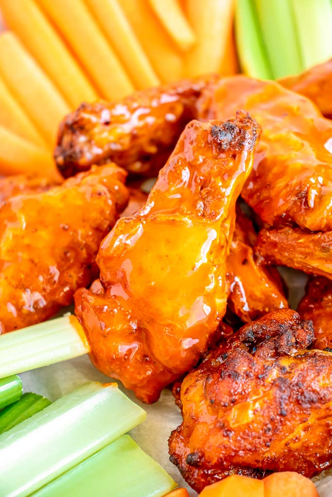 Close up of cooked chicken wings.